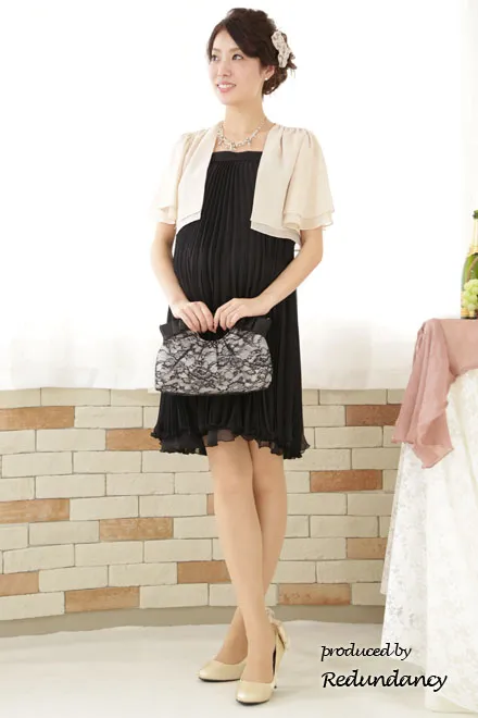 ベージュの背中レースの半袖ボレロ