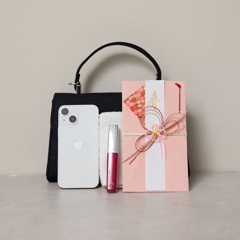 ブラックのビジューラインハンドバッグ