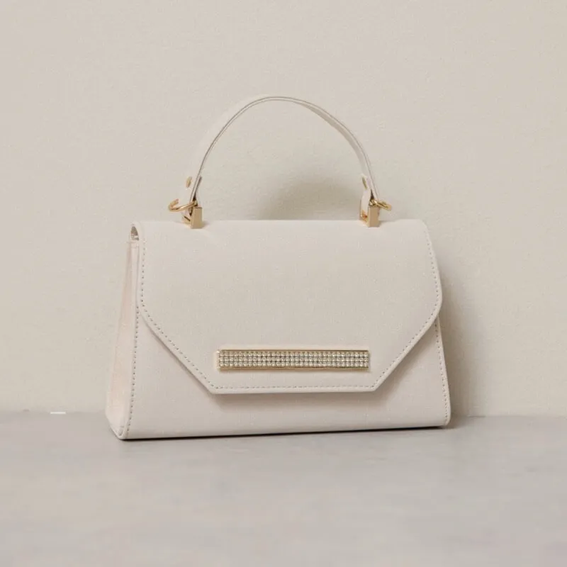 ベージュのビジューラインハンドバッグ