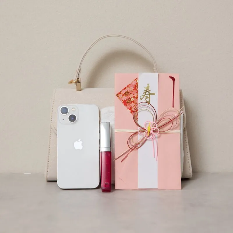 ベージュのビジューラインハンドバッグ